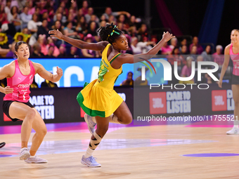 Zaudi Green of Jamaica (C) competes in the Fast5 Netball World Series match between New Zealand and Jamaica at the Wolfbrook Arena in Christ...