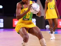 Zaudi Green of Jamaica (C) competes in the Fast5 Netball World Series match between New Zealand and Jamaica at the Wolfbrook Arena in Christ...