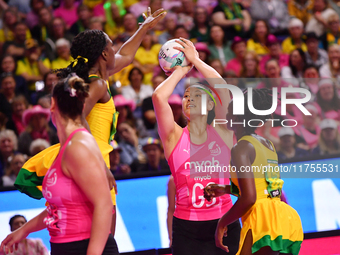 Aviour Tui of New Zealand (C) shoots during the Fast5 Netball World Series match between New Zealand and Jamaica at the Wolfbrook Arena in C...