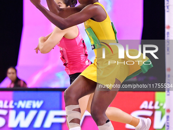 Zaudi Green of Jamaica controls the ball during the Fast5 Netball World Series match between New Zealand and Jamaica at the Wolfbrook Arena...