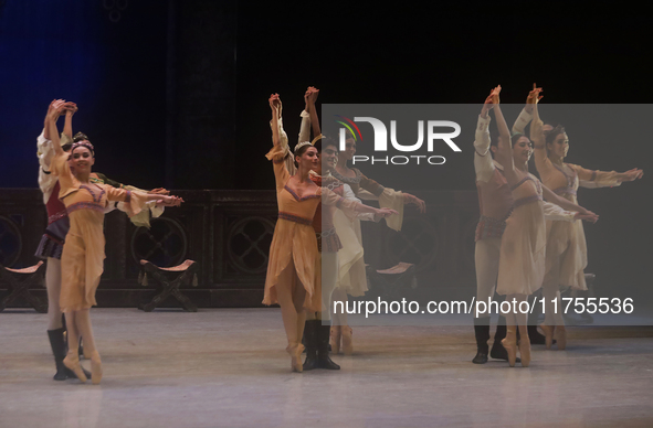 Dancers rehearse a fragment of the work Swan Lake at the Palace of Fine Arts in Mexico City, on November 8, 2024. The choreographic version...