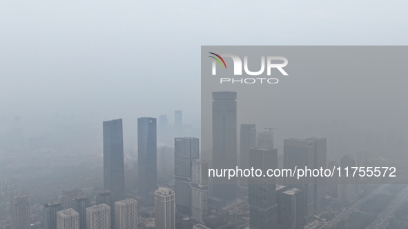 A high-tech zone is shrouded in thick smog in Xi'an, Shaanxi province, China, on November 9, 2024. 