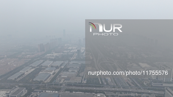 A high-tech zone is shrouded in thick smog in Xi'an, Shaanxi province, China, on November 9, 2024. 