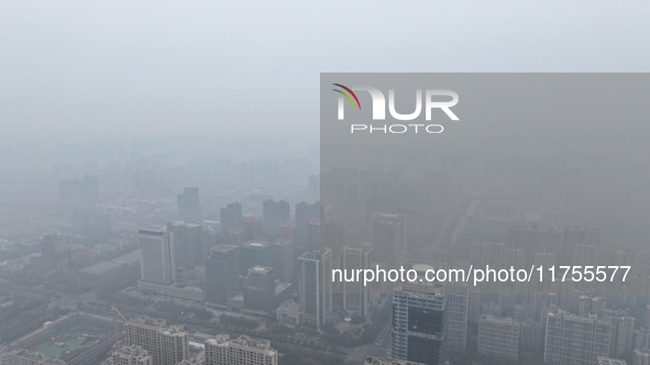 A high-tech zone is shrouded in thick smog in Xi'an, Shaanxi province, China, on November 9, 2024. 