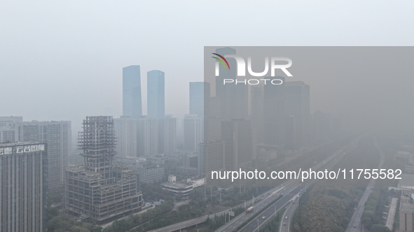 A high-tech zone is shrouded in thick smog in Xi'an, Shaanxi province, China, on November 9, 2024. 