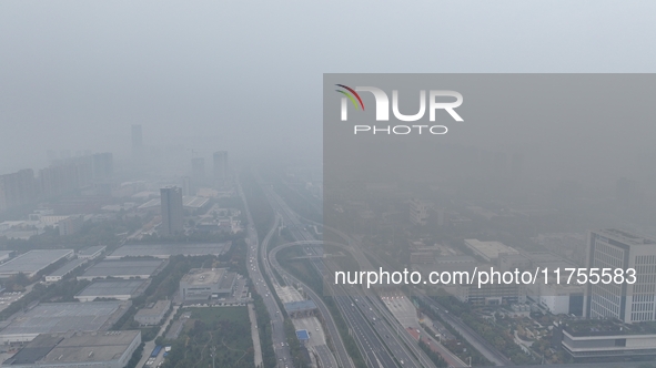 A high-tech zone is shrouded in thick smog in Xi'an, Shaanxi province, China, on November 9, 2024. 