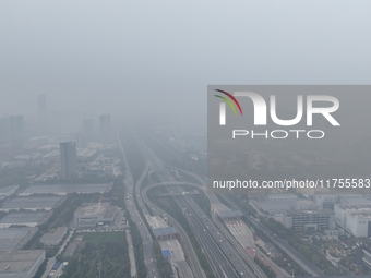 A high-tech zone is shrouded in thick smog in Xi'an, Shaanxi province, China, on November 9, 2024. (