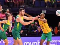 Alastair Punshon of Australia (C) passes the ball during the Fast5 Netball World Series match between Australia and South Africa at the Wolf...