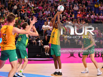 Eugene Sinxezi of South Africa (C) shoots during the Fast5 Netball World Series match between Australia and South Africa in Christchurch, Ne...