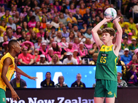 William Whiteacre of Australia (R) shoots during the Fast5 Netball World Series match between Australia and South Africa in Christchurch, Ne...