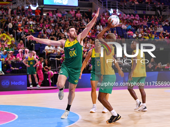 Alastair Punshon of Australia and Eugene Sinxezi of South Africa compete in the Fast5 Netball World Series match between Australia and South...