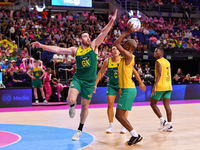 Alastair Punshon of Australia and Eugene Sinxezi of South Africa compete in the Fast5 Netball World Series match between Australia and South...