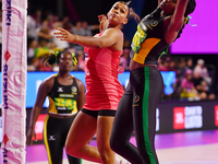 Jayda Pechova of England and Simone Gordon of Jamaica compete for the ball during the Fast5 Netball World Series match between England and J...