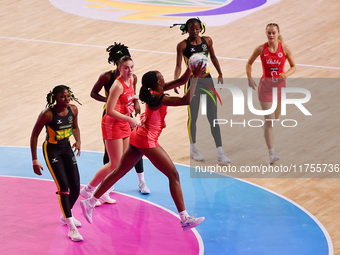 Sophie Egbaran of England controls the ball during the Fast5 Netball World Series match between England and Jamaica at the Wolfbrook Arena i...