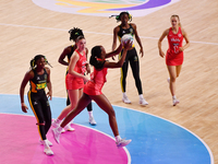 Sophie Egbaran of England controls the ball during the Fast5 Netball World Series match between England and Jamaica at the Wolfbrook Arena i...