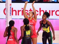 Paige Reed of England (second from right) shoots during the Fast5 Netball World Series match between England and Jamaica at the Wolfbrook Ar...