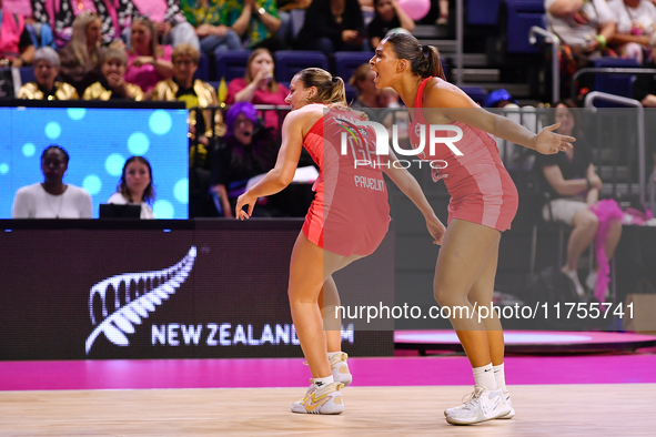 Tash Pavelin (L) and Jayda Pechova of England react during the Fast5 Netball World Series match between England and Jamaica at the Wolfbrook...