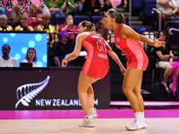 Tash Pavelin (L) and Jayda Pechova of England react during the Fast5 Netball World Series match between England and Jamaica at the Wolfbrook...