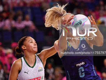 Leesa Mi Mi of Australia and Amber Coraizin of South Africa compete for the ball during the Fast5 Netball World Series match between Austral...