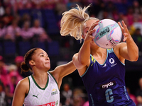 Leesa Mi Mi of Australia and Amber Coraizin of South Africa compete for the ball during the Fast5 Netball World Series match between Austral...