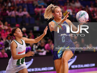 Leesa Mi Mi of Australia and Amber Coraizin of South Africa compete for the ball during the Fast5 Netball World Series match between Austral...