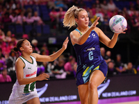 Leesa Mi Mi of Australia and Amber Coraizin of South Africa compete for the ball during the Fast5 Netball World Series match between Austral...