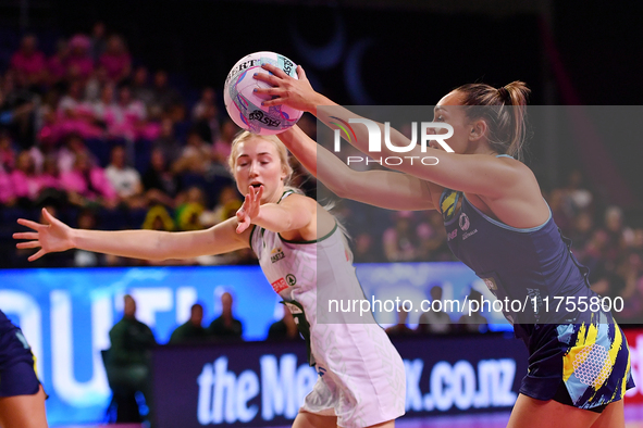 Leesa Mi Mi of Australia passes the ball during the Fast5 Netball World Series match between Australia and South Africa at the Wolfbrook Are...