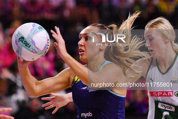 Leesa Mi Mi of Australia passes the ball during the Fast5 Netball World Series match between Australia and South Africa at the Wolfbrook Are...