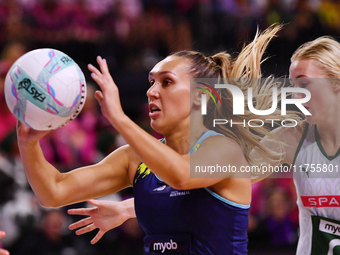 Leesa Mi Mi of Australia passes the ball during the Fast5 Netball World Series match between Australia and South Africa at the Wolfbrook Are...