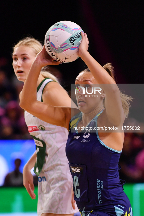 Leesa Mi Mi of Australia passes the ball during the Fast5 Netball World Series match between Australia and South Africa at the Wolfbrook Are...