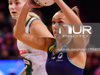 Leesa Mi Mi of Australia passes the ball during the Fast5 Netball World Series match between Australia and South Africa at the Wolfbrook Are...