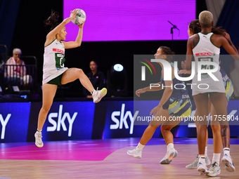 Shannen Bartlett of South Africa (L) catches the ball during the Fast5 Netball World Series match between Australia and South Africa at the...