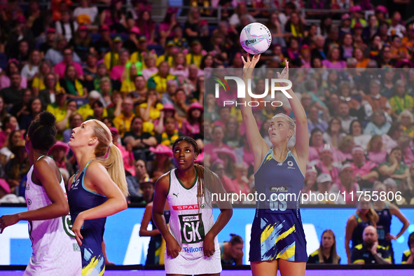 Matissa Letherbarrow of Australia (R) shoots during the Fast5 Netball World Series match between Australia and South Africa at the Wolfbrook...