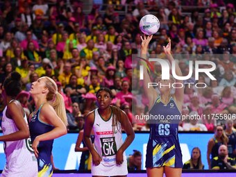 Matissa Letherbarrow of Australia (R) shoots during the Fast5 Netball World Series match between Australia and South Africa at the Wolfbrook...