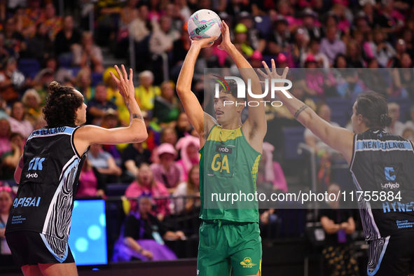 Dravyn Lee-Tauroa of Australia (C) shoots during the Fast5 Netball World Series match between New Zealand and Australia at the Wolfbrook Are...