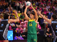 Dravyn Lee-Tauroa of Australia (C) shoots during the Fast5 Netball World Series match between New Zealand and Australia at the Wolfbrook Are...