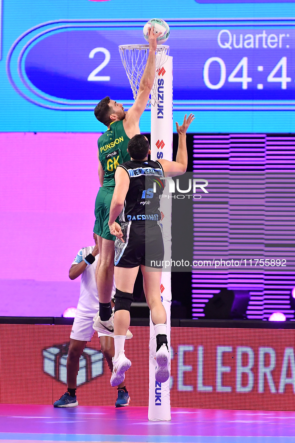 Alastair Punshon of Australia shoots a goal during the Fast5 Netball World Series match between New Zealand and Australia at the Wolfbrook A...