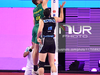 Alastair Punshon of Australia shoots a goal during the Fast5 Netball World Series match between New Zealand and Australia at the Wolfbrook A...