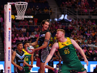 Timmy Apisai of New Zealand and Liam Killey of Australia compete in the Fast5 Netball World Series match between New Zealand and Australia a...