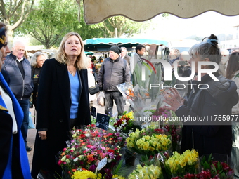 Mrs. Yael Braun Pivet, President of the National Assembly, visits the market of Neuville sur Saone in Rhone, France, on November 8, 2024. (