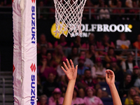 Martina Salmon of New Zealand (R) shoots during the Fast5 Netball World Series match between New Zealand and Australia in Christchurch, New...