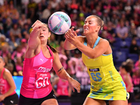 Matissa Letherbarrow of Australia (R) and Kate Burley compete in the Fast5 Netball World Series match between New Zealand and Australia at t...