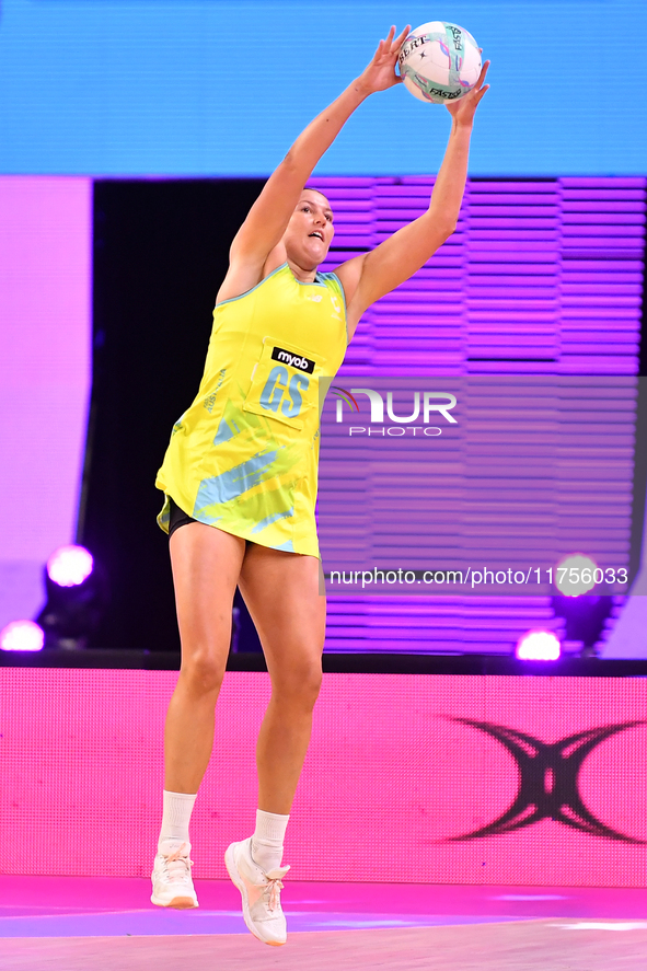 Lucy Austin of Australia jumps for the ball during the Fast5 Netball World Series match between New Zealand and Australia at the Wolfbrook A...