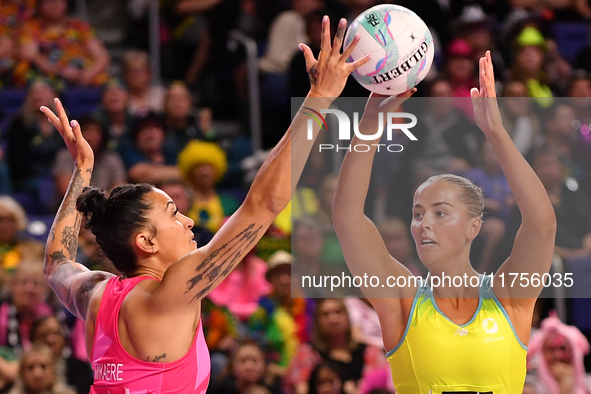 Matissa Letherbarrow of Australia and Erena Mikaere of New Zealand compete in the Fast5 Netball World Series match between New Zealand and A...