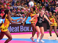 Sandra Nambirige of Uganda (left) and Harriet Jones of England (second from right) participate in the Fast5 Netball World Series match betwe...