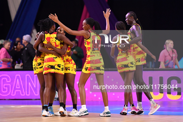 Members of the Uganda team celebrate the win against England during the Fast5 Netball World Series match between England and Uganda at the W...