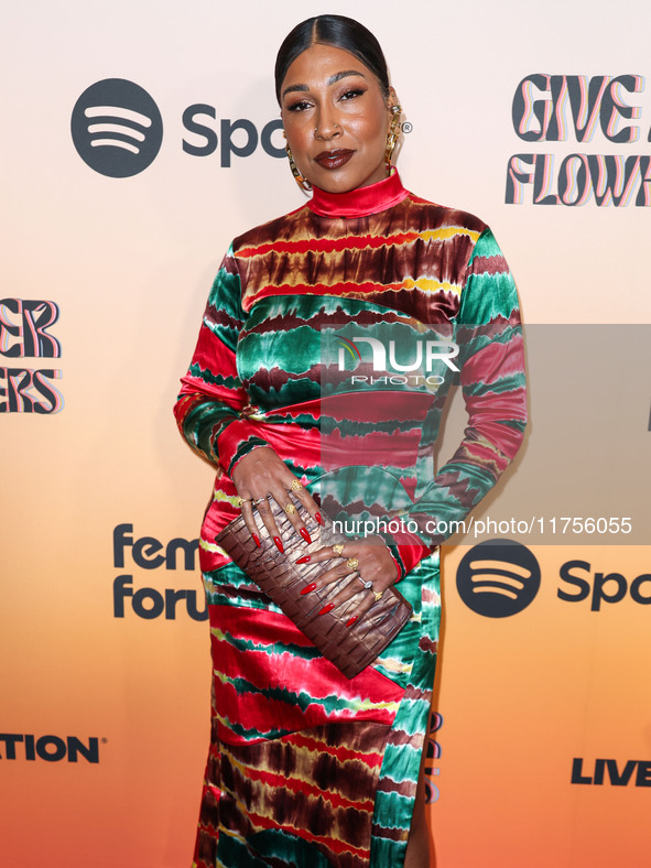 Melanie Fiona arrives at the 3rd Annual Femme It Forward 'Give Her FlowHERS' Awards Gala 2024 held at The Beverly Hilton Hotel on November 8...