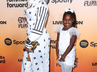 LisaRaye McCoy and daughter Bella Rae arrive at the 3rd Annual Femme It Forward 'Give Her FlowHERS' Awards Gala 2024 held at The Beverly Hil...