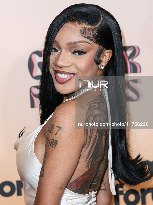 GloRilla (Gloria Hallelujah Woods) arrives at the 3rd Annual Femme It Forward 'Give Her FlowHERS' Awards Gala 2024 held at The Beverly Hilto...