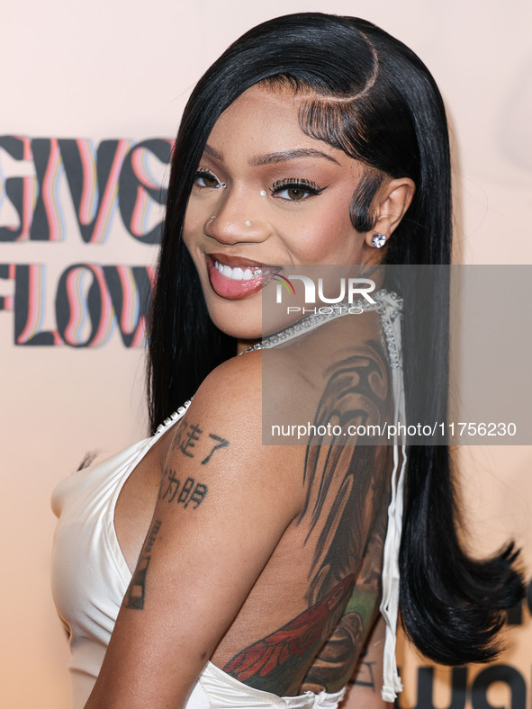 GloRilla (Gloria Hallelujah Woods) arrives at the 3rd Annual Femme It Forward 'Give Her FlowHERS' Awards Gala 2024 held at The Beverly Hilto...